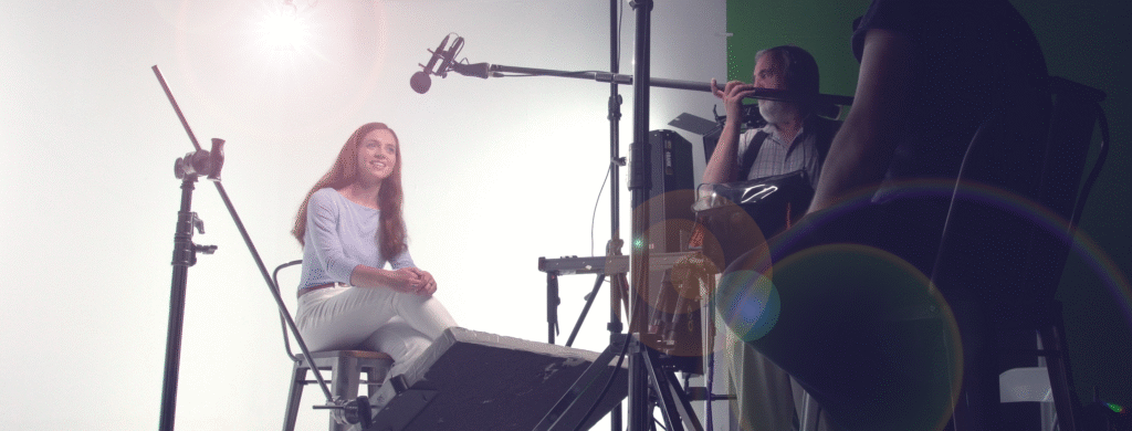 A film crew recording a video interview for a medical charity television advert